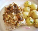 Pescadilla al horno con sofrito de cebolla